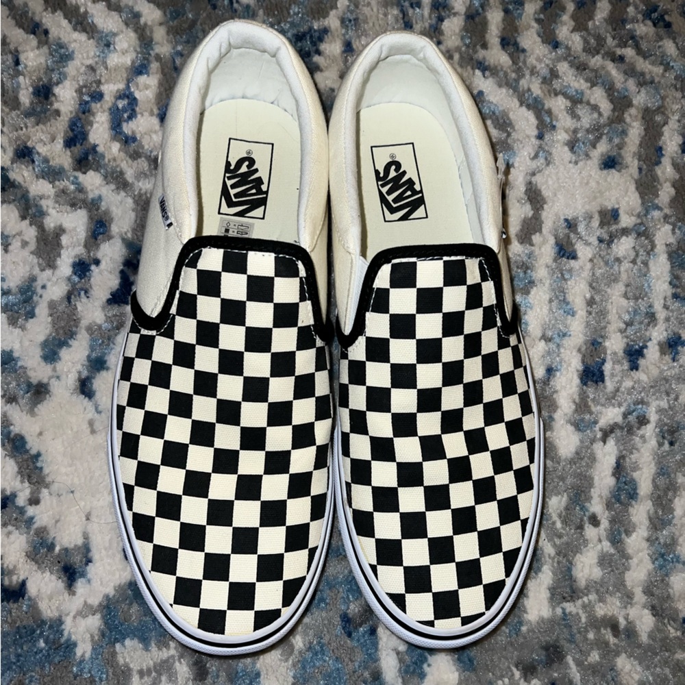Authentic black and white checkerboards slip on Vans men’s size 11.5
